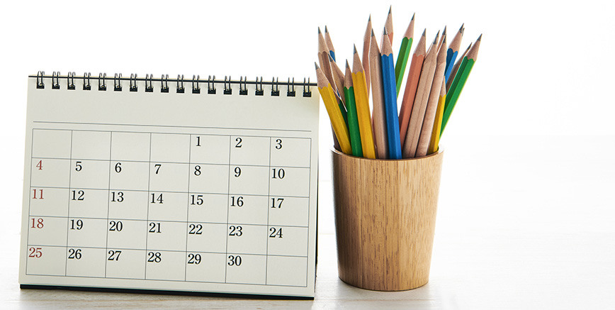 flip calendar with a pot of colouring pencils